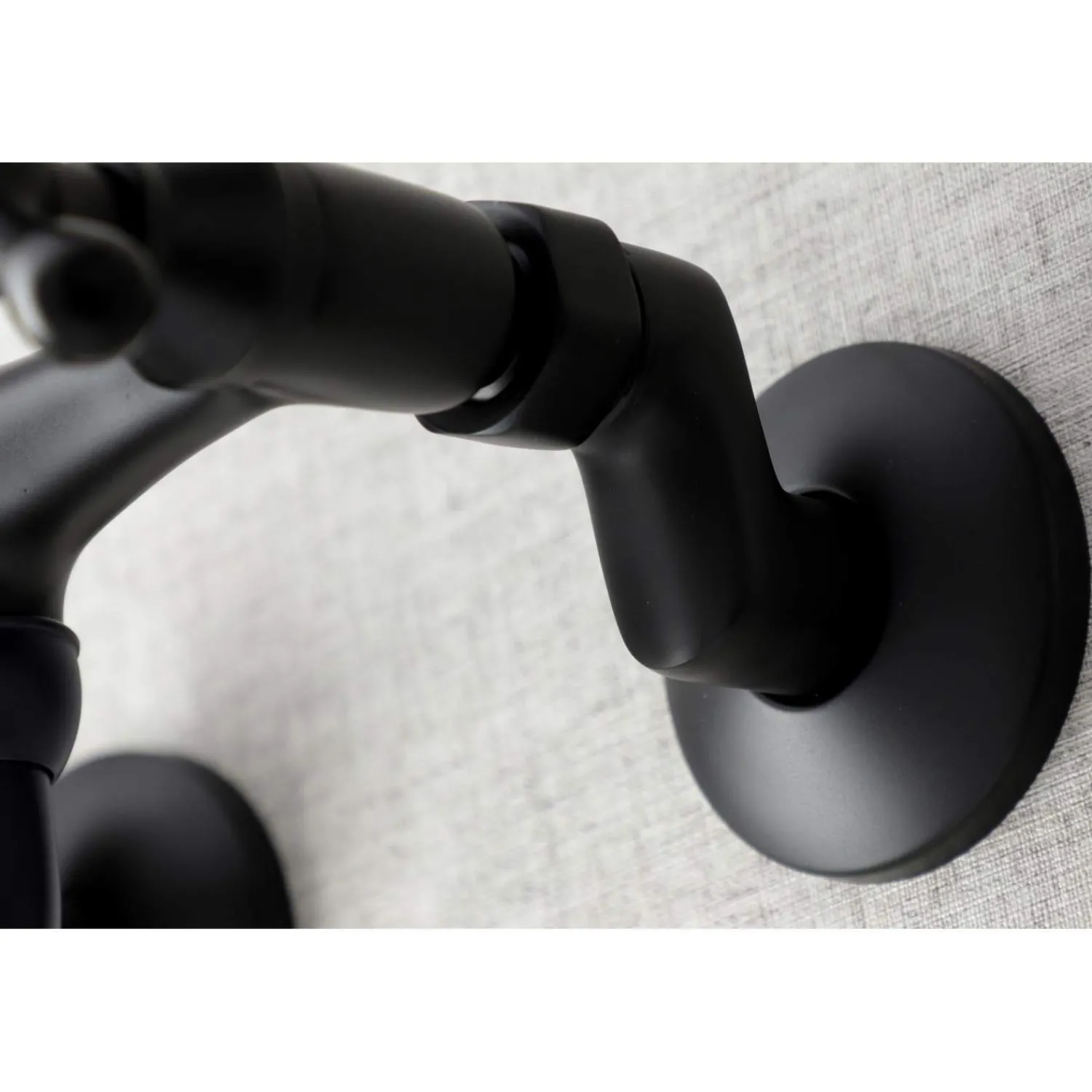 KS216MB Kingston Two Handle Wall Mount Bathroom Faucet, Matte Black Wall Mount