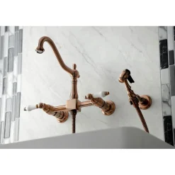 KS124XPLBS-P Heritage Two-Handle Wall Mount Bridge Kitchen Faucet with Brass Sprayer Wall Mounted Kitchen Faucets