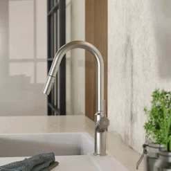 Outlet Kitchen Faucet with Curved Spout in Brushed Nickel Single Hole